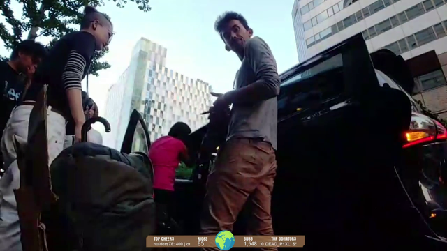 Rider asks Hitch to sign his car.