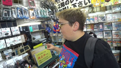 Store employee uses translator to understand Andy