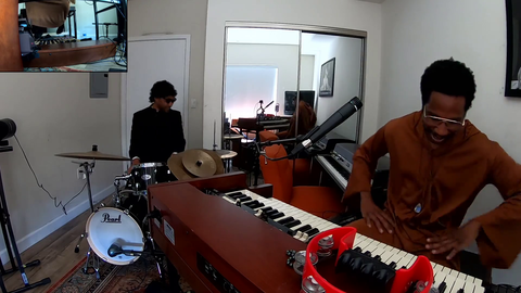 Insane musician Cory Henry plays three instruments at the same time, and with his feet