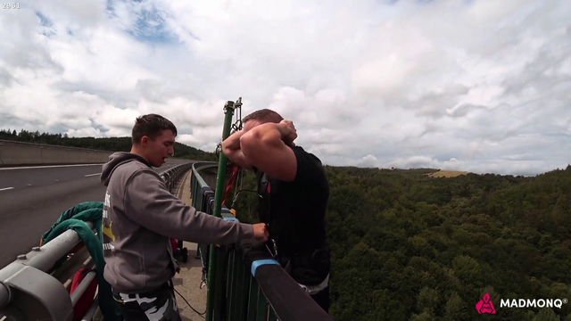 Knut jumps off a bridge backwards