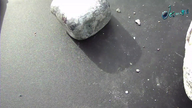 Jerma eats a rock in front of a horrified scientist