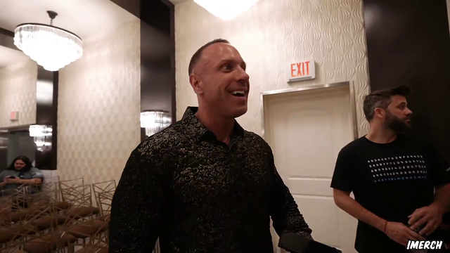 Nick makes a business deal at Knut's wedding