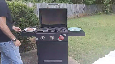 Boomer drops plate while grilling