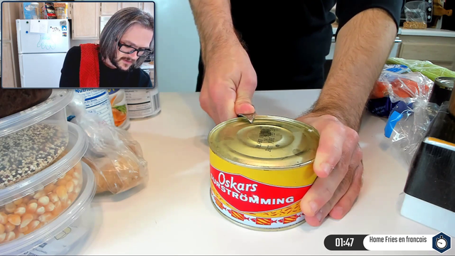 MikeSci opens Surströmming he found in his pantry.