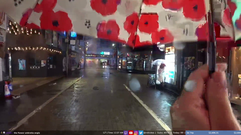 Angle of Shibuya gives heat packs to girl in cold / rainy weather - she's very grateful!