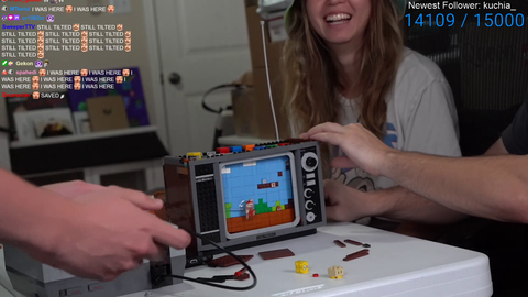 Maya finishes Super Mario lego set.