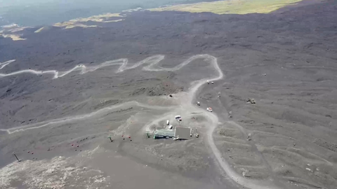 Mt Etna rumbles while streamer uses air drone. Mt Etna had an eruption just last week and is full of tourists today.