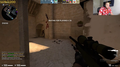 Erobb flexes his awp skills on a bot in warmup