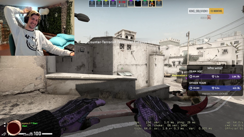 Jesse hits a bong with a teammate in CSGO