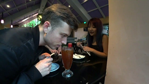 Jake takes a sip of eloise's drink