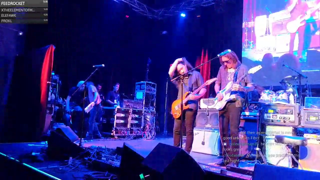 Dragonforce guitarist playing with Steve Vai at charity event