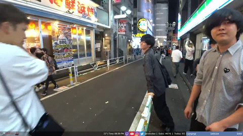 Overgrown crow takes a perch on a degen street corner in Shibuya