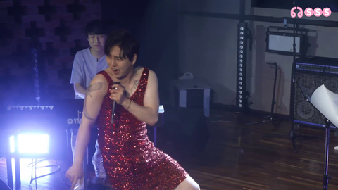 Male singer rocks a dress at SSS studio