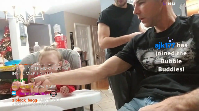 Baby learns how to use a spoon