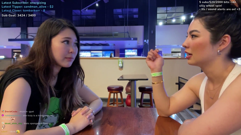Caroline armwrestles Emily