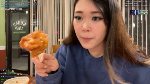 Emily shows viewers her raw chicken but she claims it's cooked. Decide for urself