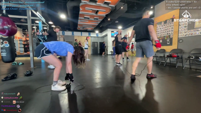 Emily smiles for the camera during intense workout