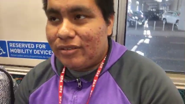 Scufious (Mexican Andy) gets frightened when a guy asks him if he is recording him in the train (IRL)