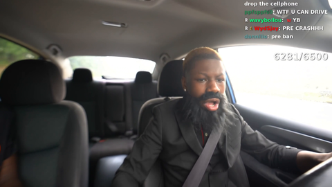 16 year old Rakai stream himself driving while being fully distracted by his phone