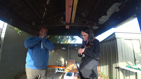 Broxh hair flicks in front of the NZ Prime Minister