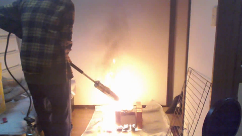 Japanese guy trying to BBQ in his room