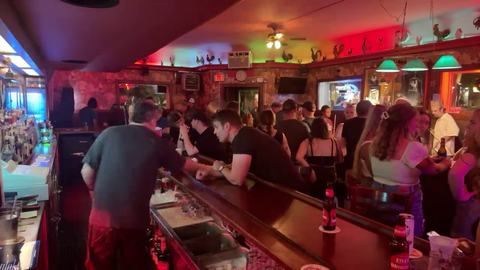 Casual punch, spit and theft between 'friends' at a bar