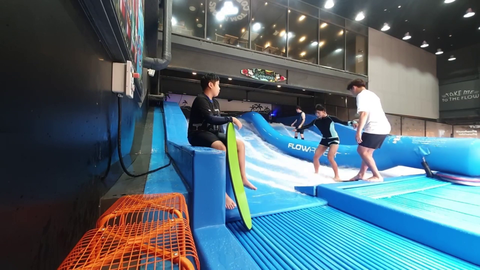 Jinny tries indoor surfing
