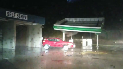 Hurricane Florence, blows down a gas station