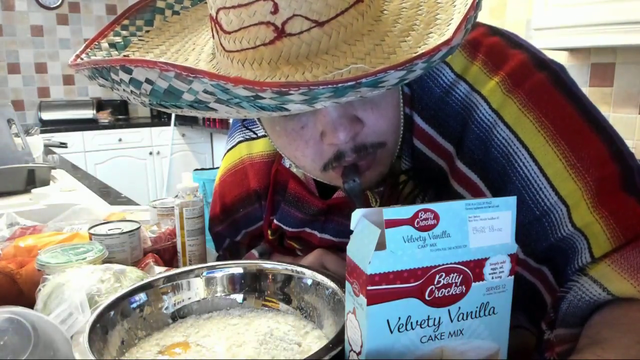Greek unknowingly sweating into his cake mix