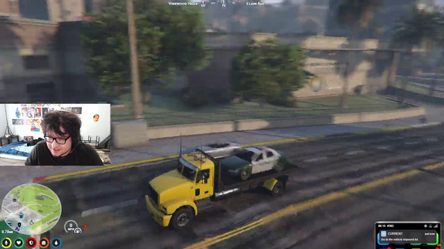 Louis towing a cop's car