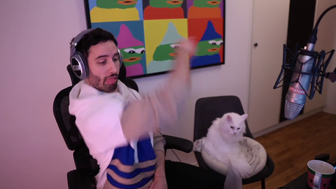 Man with special needs plays with support cat