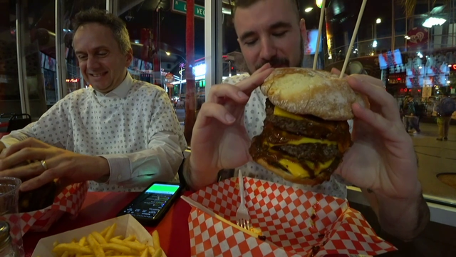 How an american and french man eat burgers