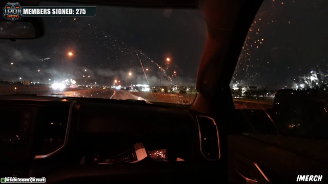 Knut stops on the highway to help push a car out of the road