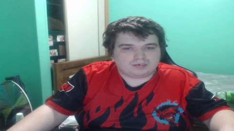 Missing tooth streamer doesn't notice a cockroach crawl into his hair.