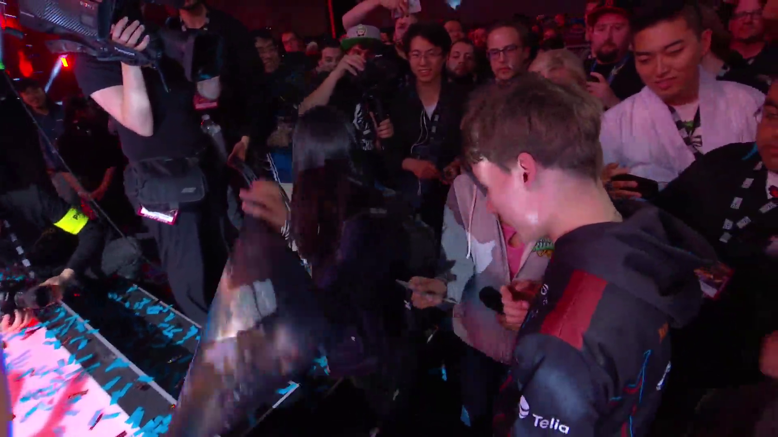 Serral signing fan merch after win