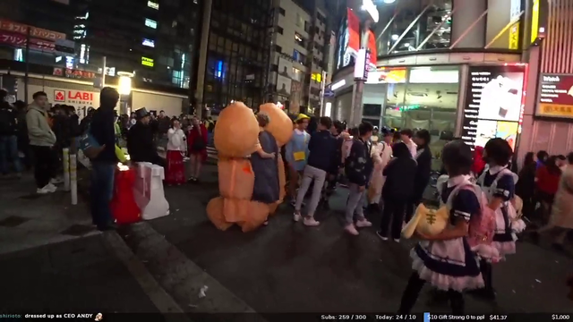 Girl strokes 2 giant dicks in public street