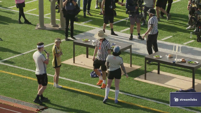Valkyrae tries to hold referee's hands 
