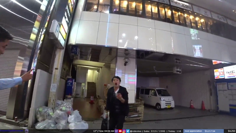 Rob stumbles upon a very enthusiastic salaryman