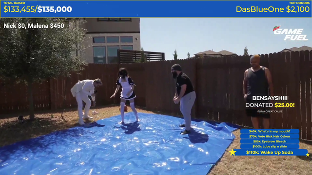 Emiru and syn4ack race each other on a lube-covered slip n slide.