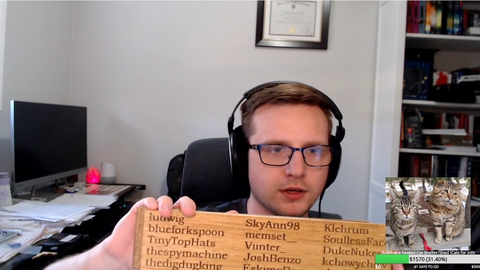 Small streamer who raised money for abandoned cats engraved every donator's name in wood to show his thanks
