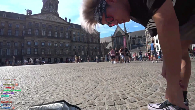 Joey break dancing at the big square in Amsterdam