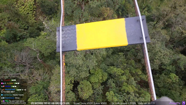 Jinny walks on a sky bridge