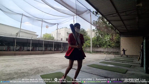 Streamer tries to hit a baseball