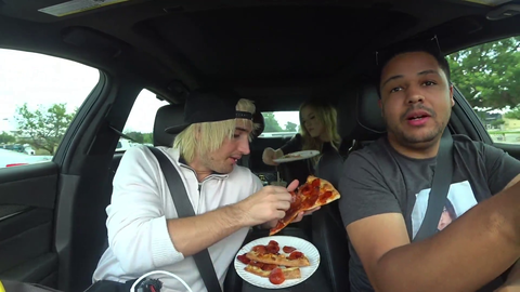 Mitch literally removes the entire pizza from his pizza