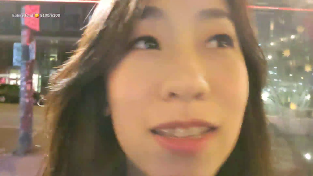 Yumi defuses a moment with a consumer in front of a weed store