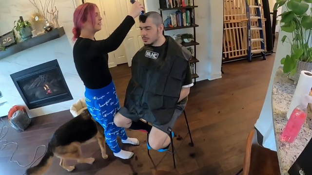 Greek shaves his head