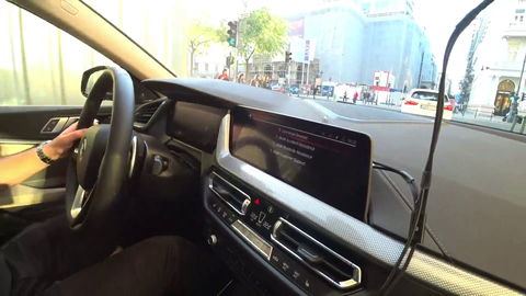 Jake calls BMW Concierge and gets recommended the driver's favorite burger place in Budapest
