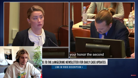 Amber Heard caught 4k posting for a picture while on the stand