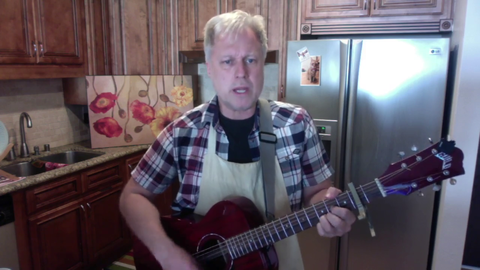 Henry accurately plays a classic acoustic guitar song