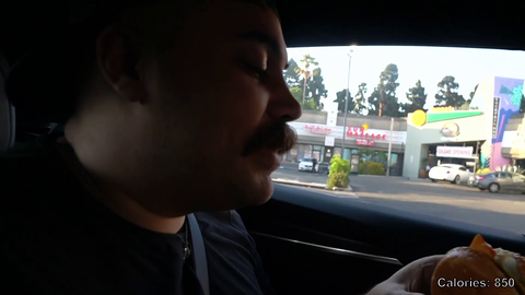 Nandre one-bites a Whopper Jr.